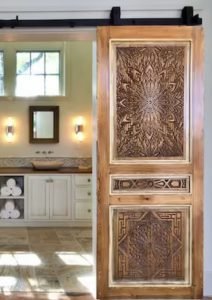 Carved bathroom doors